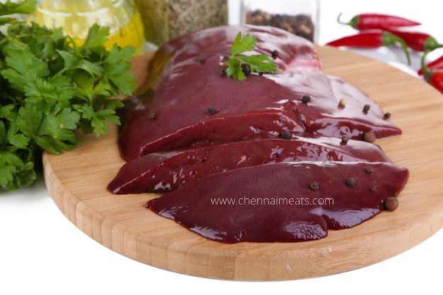 Buy Fresh Mutton Liver Chunk - Raw Liver on Wooden Board with Spices and Condiments