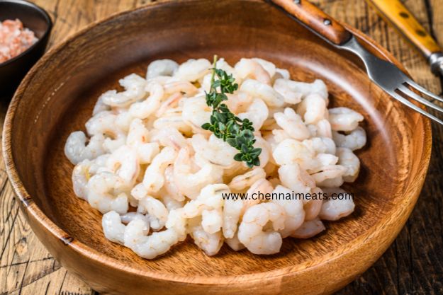 Buy Fresh Seawater White Prawn Small Deveined - Peeled Shrimps, Prawns in a Wooden Bowl